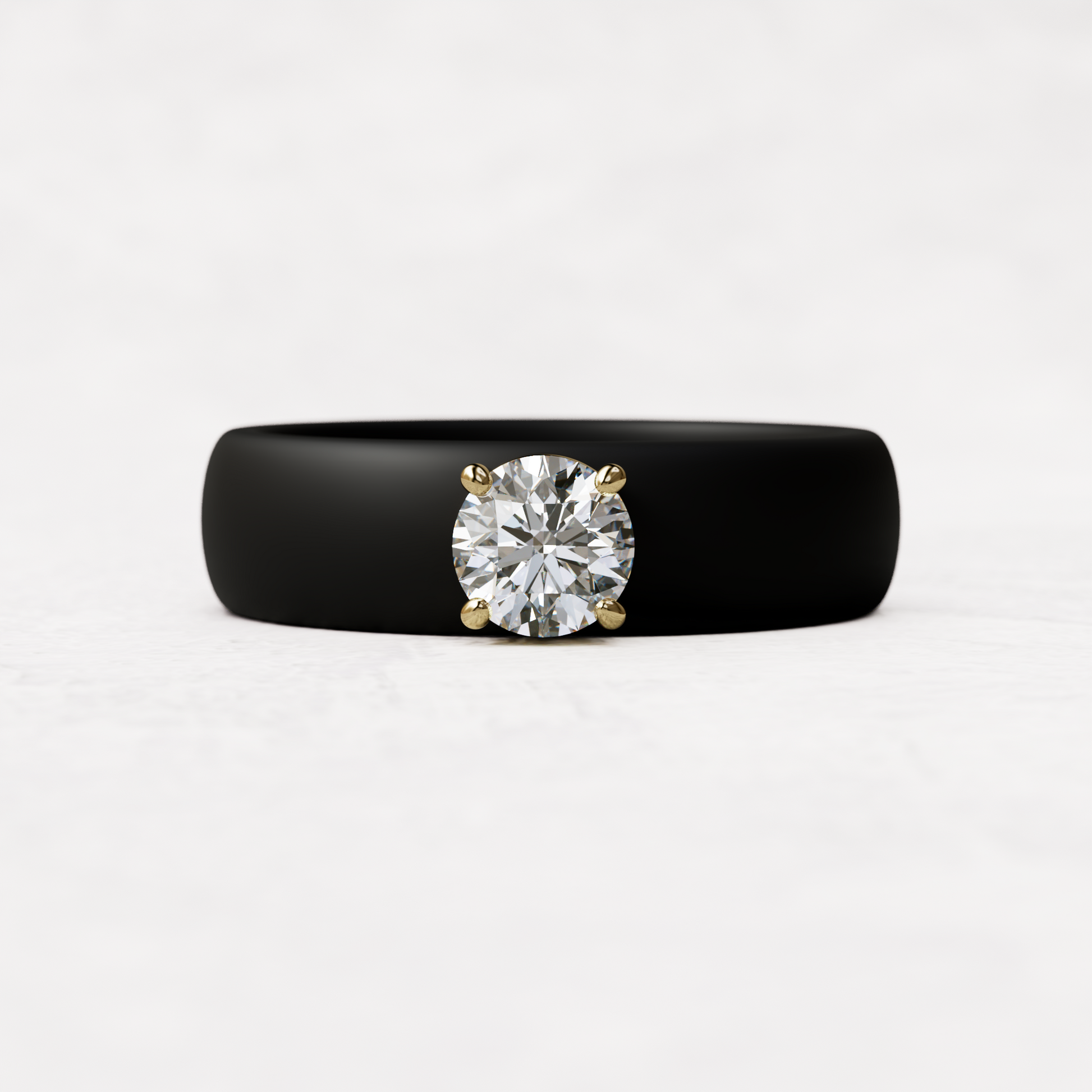 half carat round diamond with black silicone band in 14 karat gold
