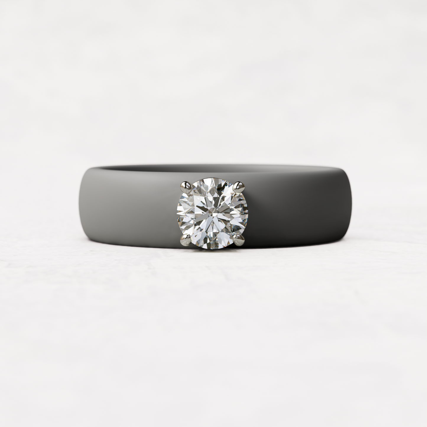 half carat round diamond with gray silicone band in 14 karat white gold