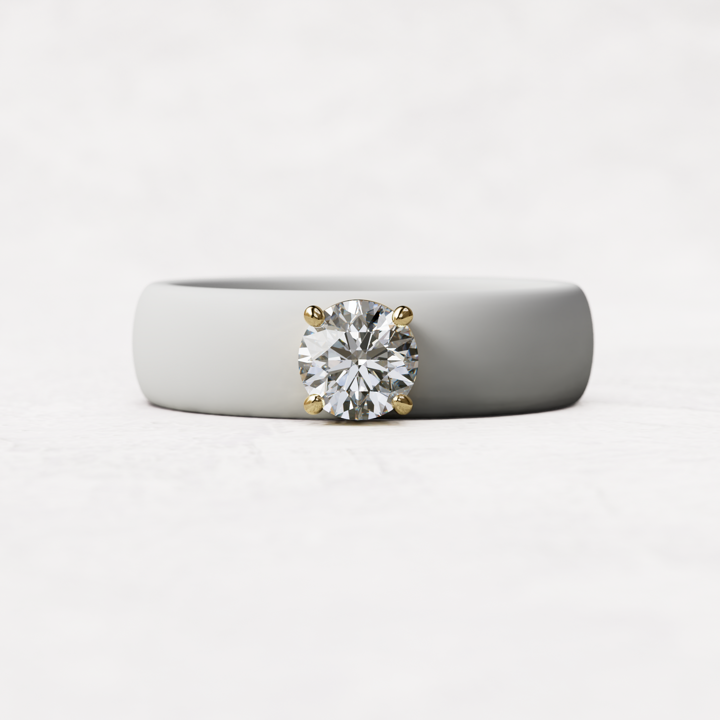 half carat round diamond with white silicone band in 14 karat gold