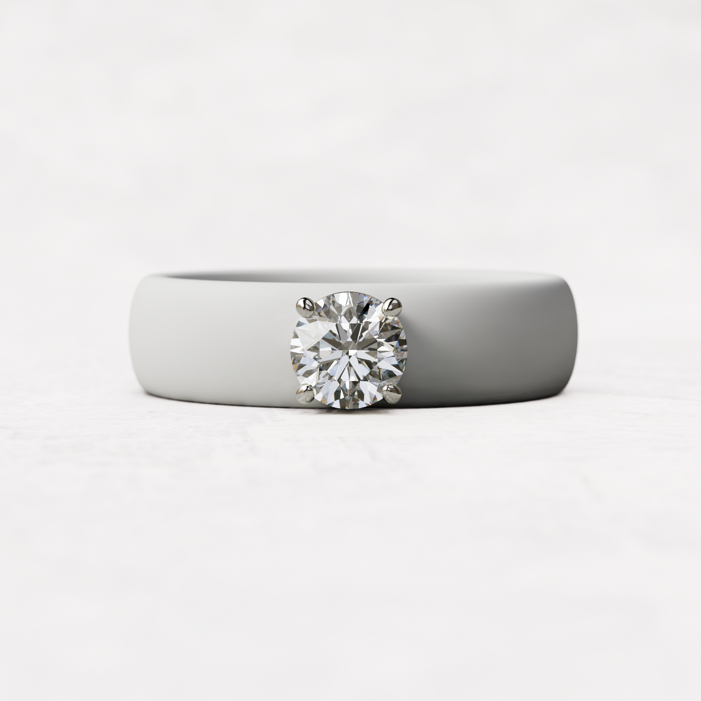 half carat round diamond with white silicone band in 14 karat white gold
