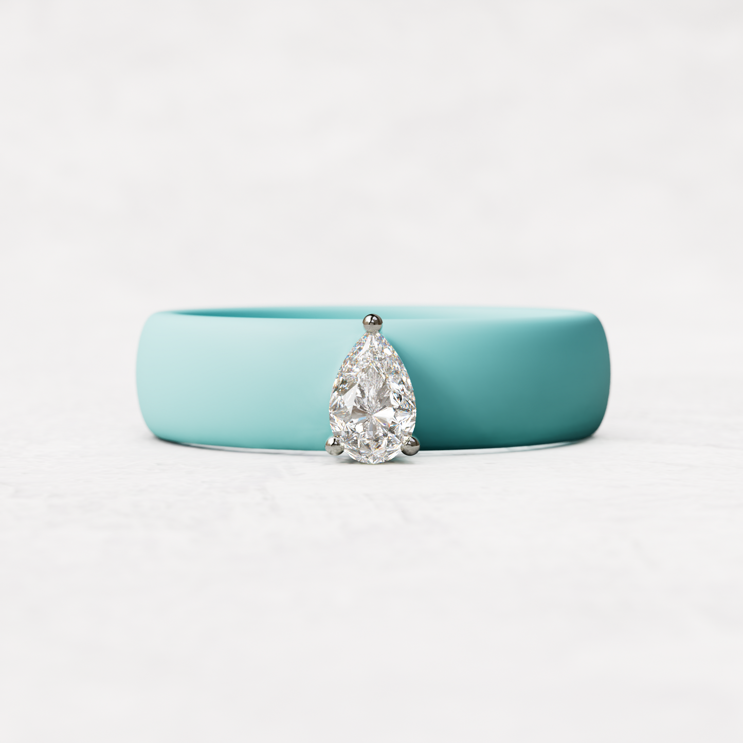 Aqua silicone quarter carat pear diamond ring set in 14 karat white Gold 