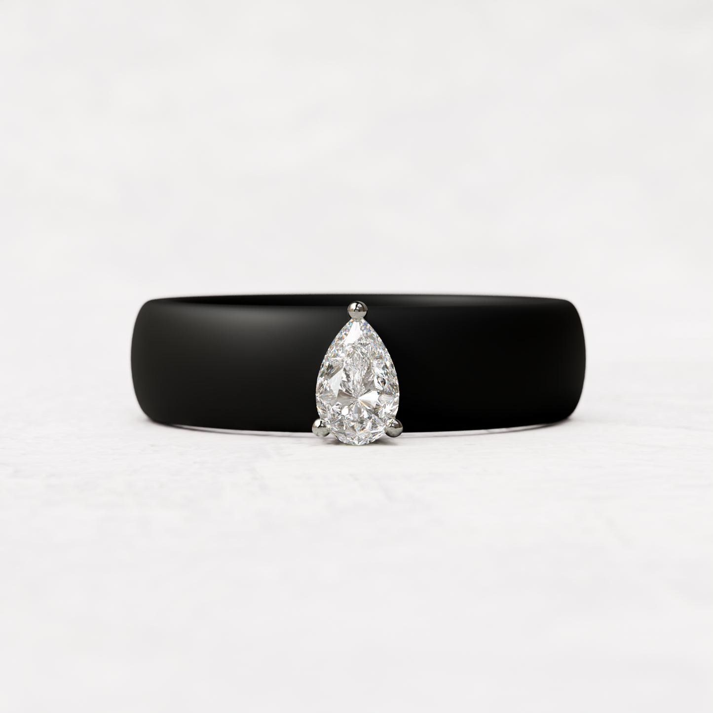 Black silicone band with quarter carat pear diamond ring set in 14 karat white Gold 