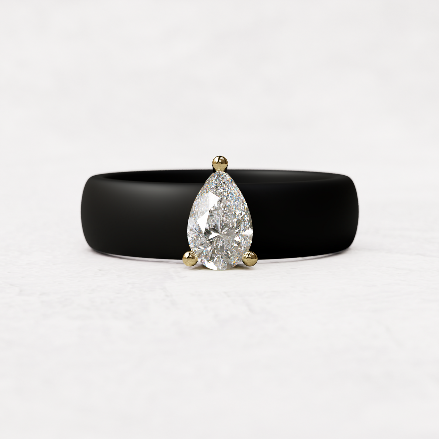 Black silicone band with .514 carat pear diamond set in 14 karat Gold