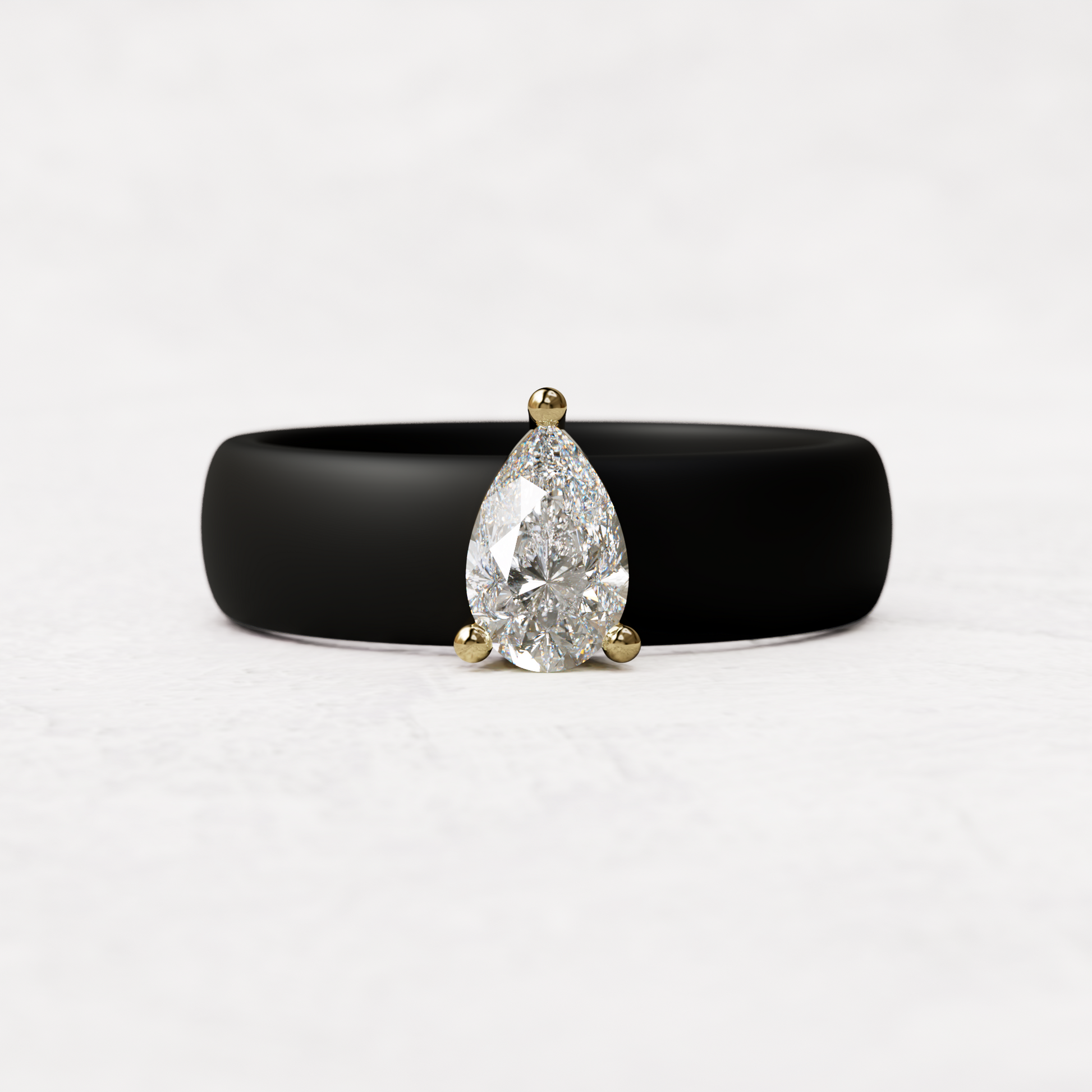Black silicone band with .514 carat pear diamond set in 14 karat Gold