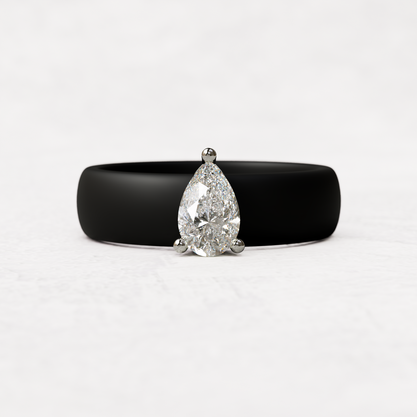 Black silicone band with .514 carat pear diamond set in 14 karat white Gold