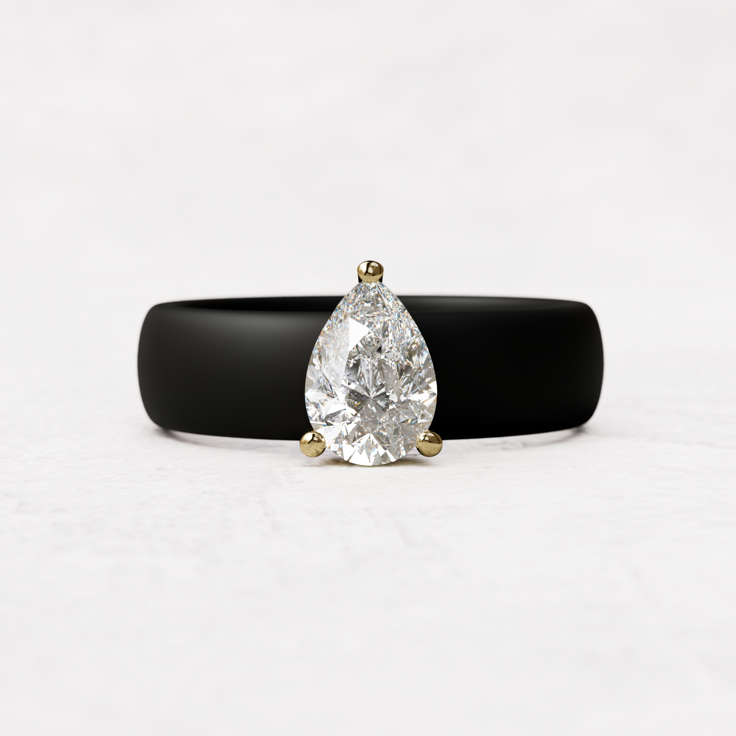 Black silicone band with 1 carat pear diamond set in 14 karat Gold