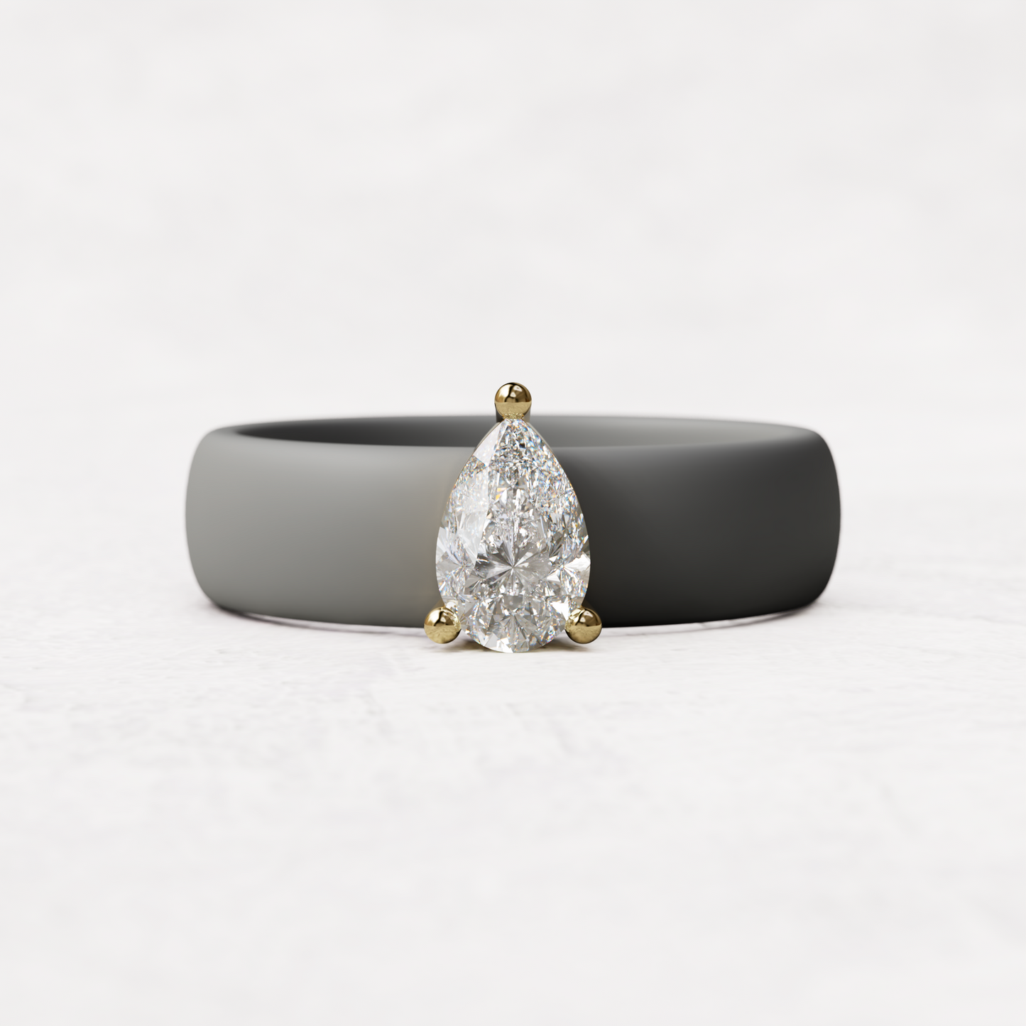 Gray silicone band with .514 carat pear diamond set in 14 karat Gold