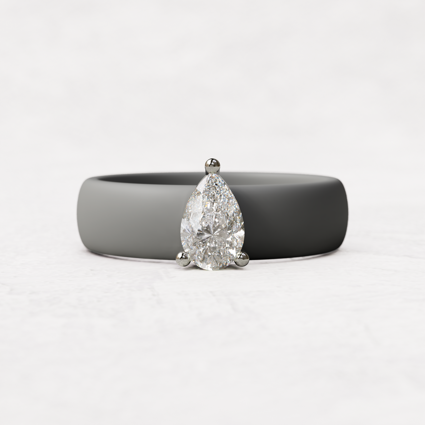 Gray silicone band with .514 carat pear diamond set in 14 karat white Gold