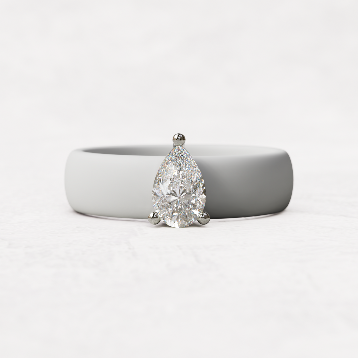 White silicone band with .514 carat pear diamond set in 14 karat white Gold