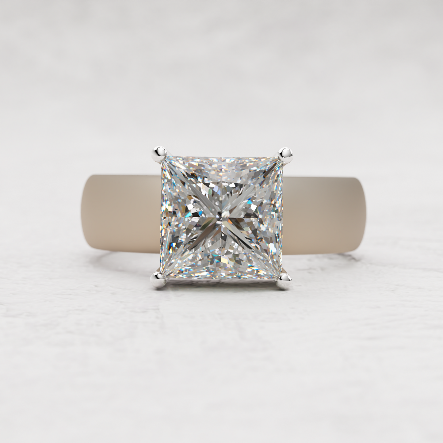 A princess-cut diamond solitaire ring in a four-prong setting on a polished silver band, displayed on a neutral beige stand against a light gray textured background.